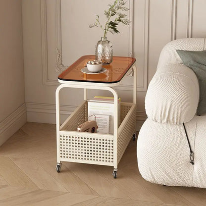 Cream-colored movable sofa trolley with simple wind design, featuring side storage and versatile functionality for living room use.