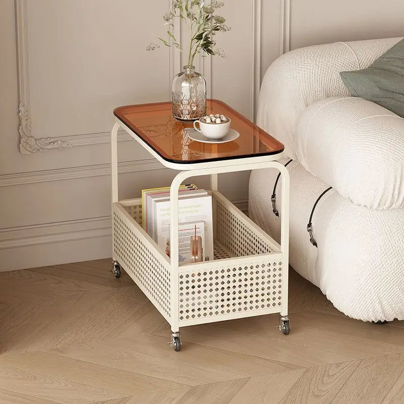 Cream-colored movable sofa trolley with a simple design, featuring side storage and wind-resistant features for versatile use.
