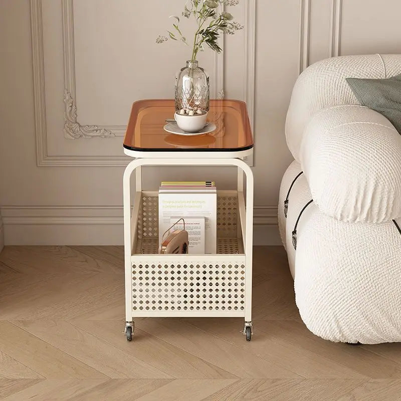 Cream-colored movable sofa trolley with a simple wind-resistant design, ideal for side placement in living rooms.