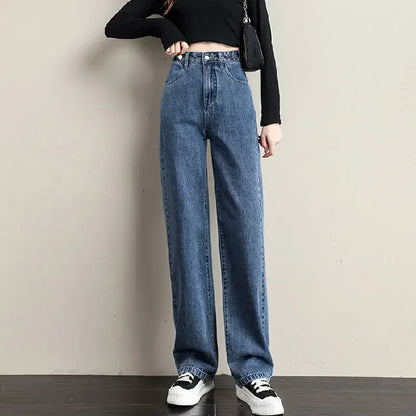 Light blue loose women’s high waist jeans with straight fit, cotton fabric, retro style, and adjustable waist for a comfortable casual look.