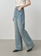 Light blue women's high-waist straight-leg raw denim jeans with slim fit and 3D cut, ideal for early autumn fashion.