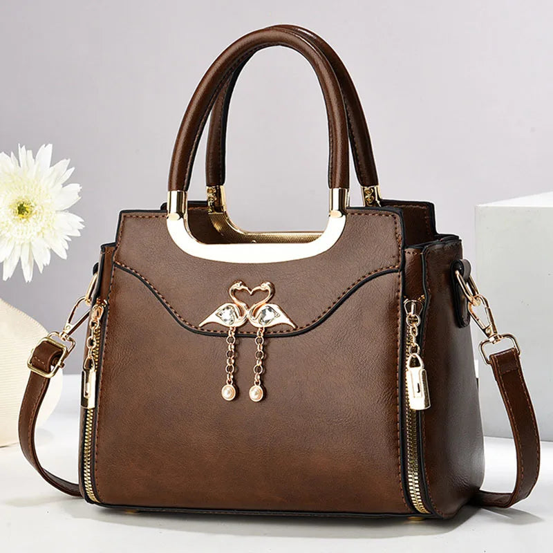 Light brown women’s shoulder bag with casual foreign style, crossbody strap, pillow shape, and underarm carrying option.