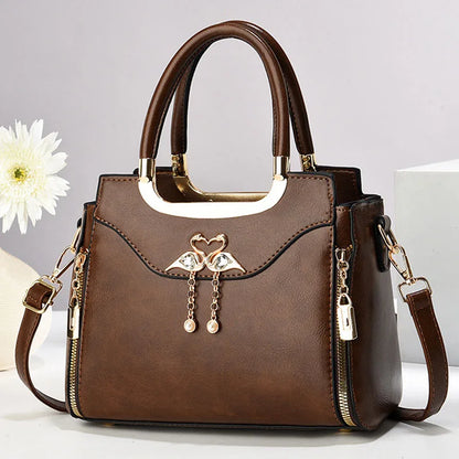 Light brown women’s shoulder bag with casual foreign style, crossbody strap, pillow shape, and underarm carrying option.