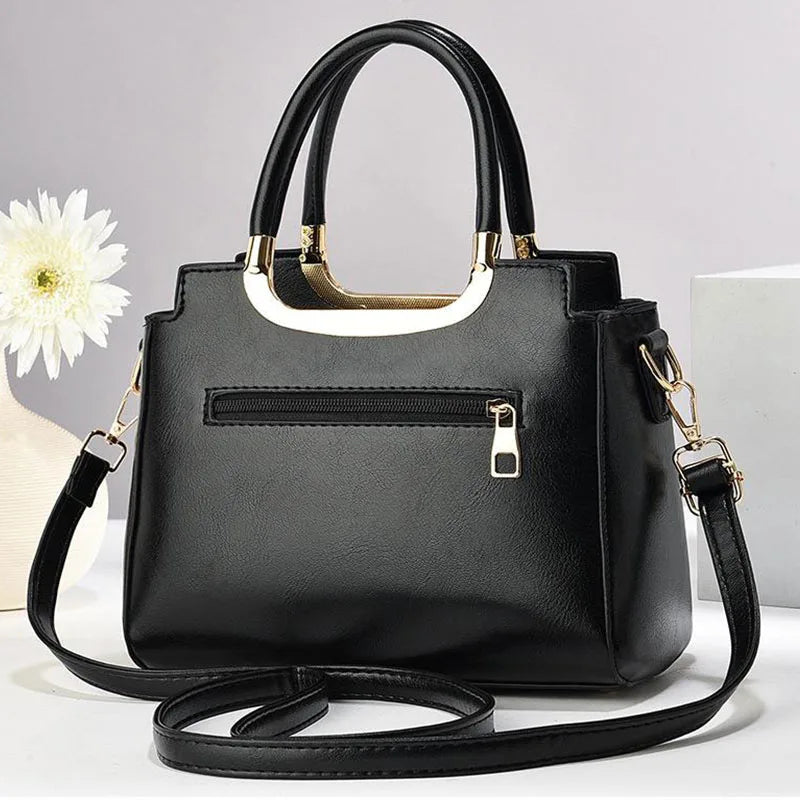 Light brown women's shoulder bag with casual foreign style, crossbody strap, pillow design, and underarm carry option.