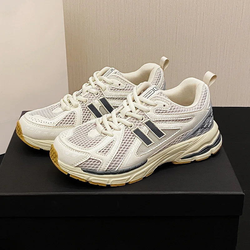 Light gray men's and women's running and basketball sneakers by BackupMyFilesNow.com, featuring retro casual design and classic style.