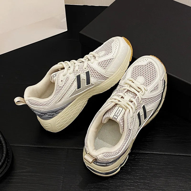 Light gray men's and women's running and basketball shoes by BackupMyFilesNow.com, featuring retro casual design and classic sneaker style.