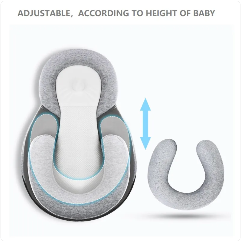 Light grey Baby Anti-Spit Up Pillow with safety strap from BackupMyFilesNow.com, designed to support and comfort infants during feeding.