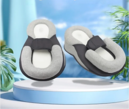 Light grey Baby Anti-Spit Up Pillow with safety strap from BackupMyFilesNow.com, designed to keep babies comfortable during feeding.