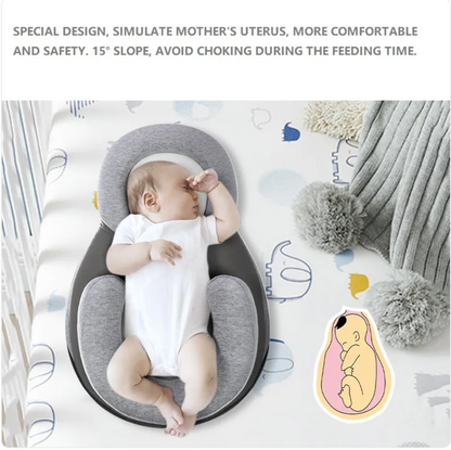 Light grey baby anti-spit up pillow with safety strap from BackupMyFilesNow.com, designed to keep babies comfortable and reduce spit-up.