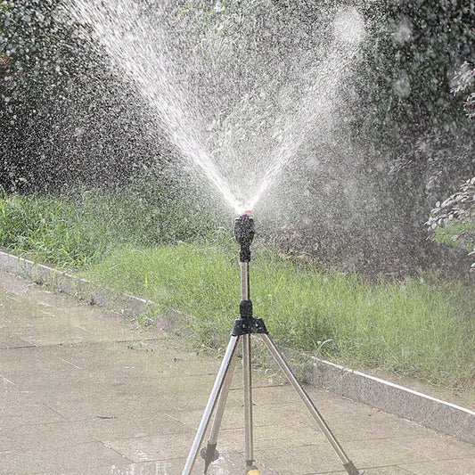 Stainless steel rotating sprinkler with variable flow control for high-pressure garden irrigation system, designed for automatic watering.