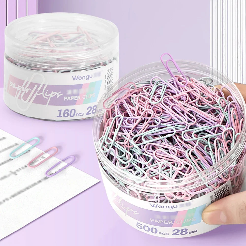 Color paper clips from BackupMyFilesNow.com, large file bookmarks and storage boxes for office supplies and stationery organization.