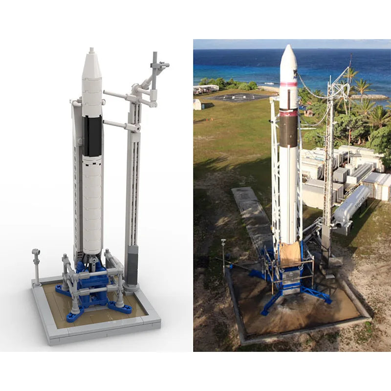 Scale model of SpaceX Falcon 1 rocket with launch building blocks, featuring Saturn V and Falcon 9, universe-themed artificial satellite.