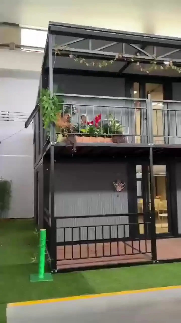 Double-story duplex container house by BACKUPMYFILESNOW.COM®, luxury prefabricated villa with 2-5 bedrooms, kitchen, and bathroom.