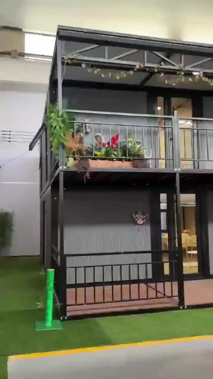 Double-story duplex container house by BACKUPMYFILESNOW.COM®, luxury prefabricated villa with 2-5 bedrooms, kitchen, and bathroom.