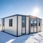 Double-story duplex container house by BACKUPMYFILESNOW.COM® with 2-5 bedrooms, kitchen, and bathroom in a modern prefabricated design.