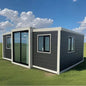 Double-story duplex container house by BACKUPMYFILESNOW.COM® with 2-5 bedrooms, kitchen, and bathroom in a modern prefabricated design.