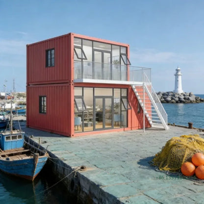Double-story duplex container house by BACKUPMYFILESNOW.COM® with 2-5 bedrooms, kitchen, and bathroom in a modern prefabricated design.