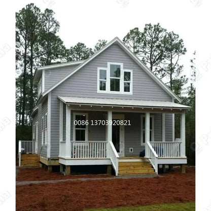 Two-story luxury modular tiny house with steel frame and prefab design, featuring large windows and modern exterior siding.