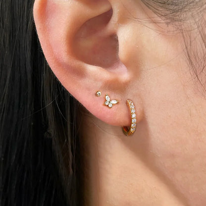 Gold 18K Europe and America cross-border earrings set with zircon, featuring three stylish eardrops in a fashion jewelry design.