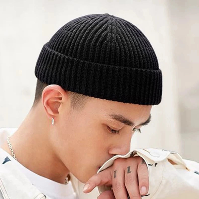 Knitted wool beanie cap for men and women, simple solid design, warm and trendy skullies hat for autumn and winter.