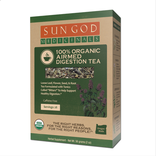 Organic Airmed Digestion Herbal Tea by BACKUPMYFILESNOW.COM®; fresh herbal blend in a glass cup with tea leaves.