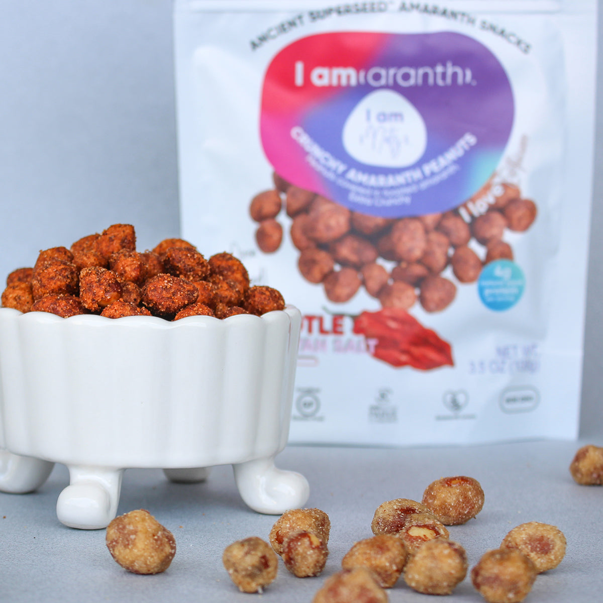 Eight-pack of BACKUPMYFILESNOW.COM® Chipotle and Himalayan Salt Peanuts, 3.5 oz each, in colorful snack packaging
