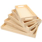 Set of five natural wood nested serving trays with handles, ideal for food, craft, and decor organization.