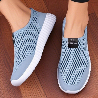 Navy blue women slip-on mesh walking shoes by BackupMyFilesNow.com, lightweight and fashionable for easy daily wear and hiking.
