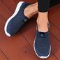 Navy blue women’s slip-on mesh walking shoes by BackupMyFilesNow.com, lightweight and fashionable for easy daily wear and hiking.