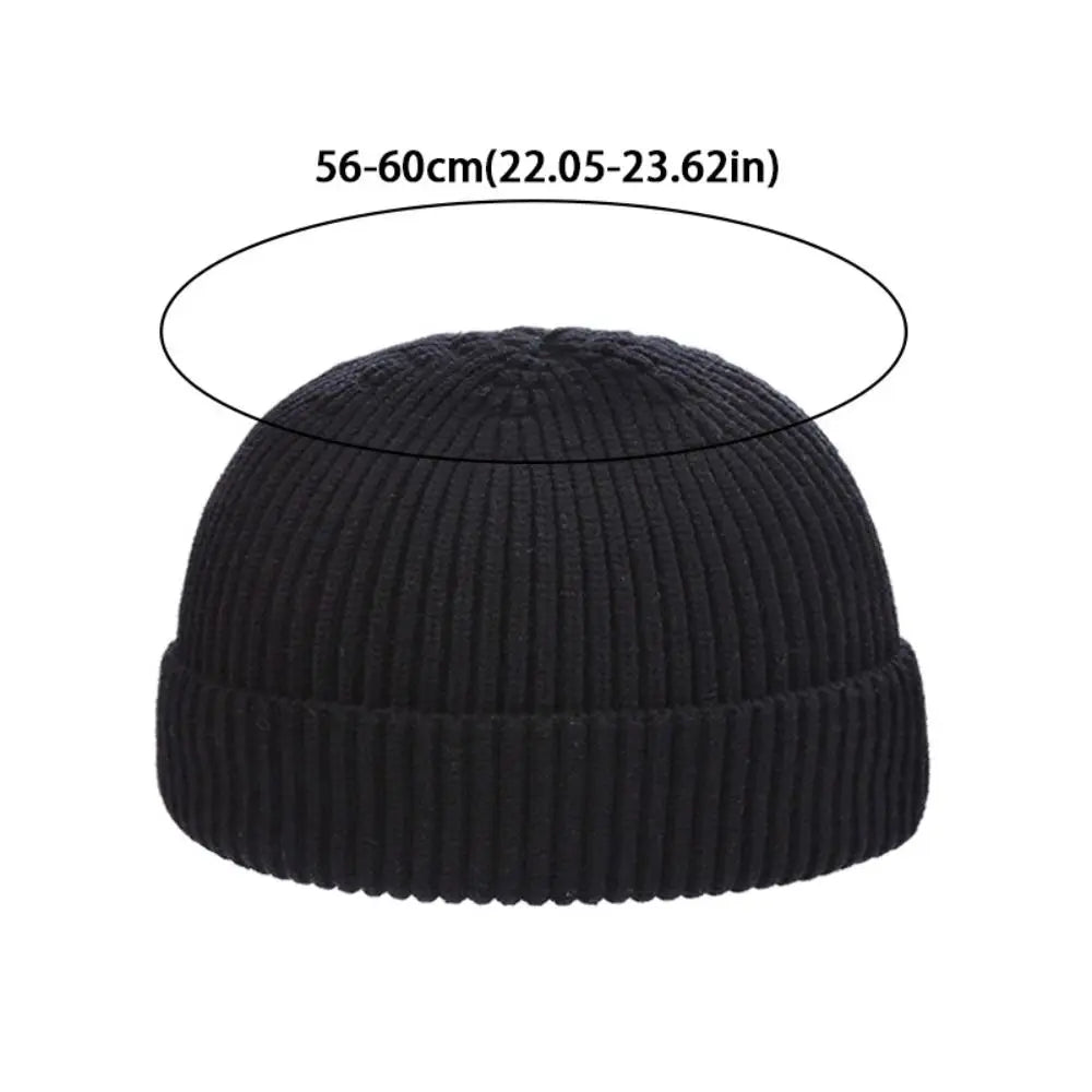 Gray unisex knitted winter beanie hat for women and men, casual elastic skullcap for autumn, stylish and warm.
