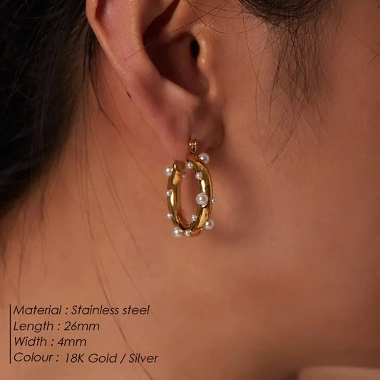 Gold plated stainless steel huggie hoop earrings with colorful zircon and freshwater pearl accents, trendy statement jewelry.