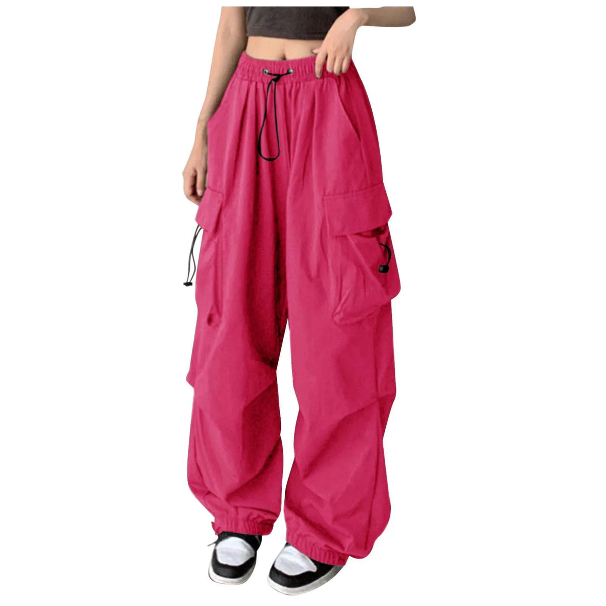 Orange camouflage cargo pants for women with large pockets, high waist, relaxed fit, and adjustable straight-leg design.