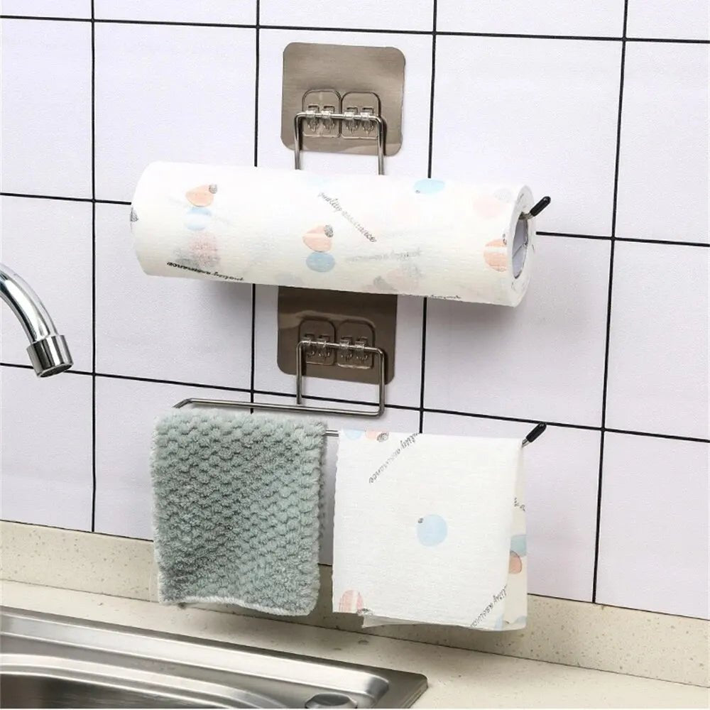 Two adhesive kitchen paper towel holder racks, wall-mounted tissue dispensers for toilet paper and napkins in a home kitchen.