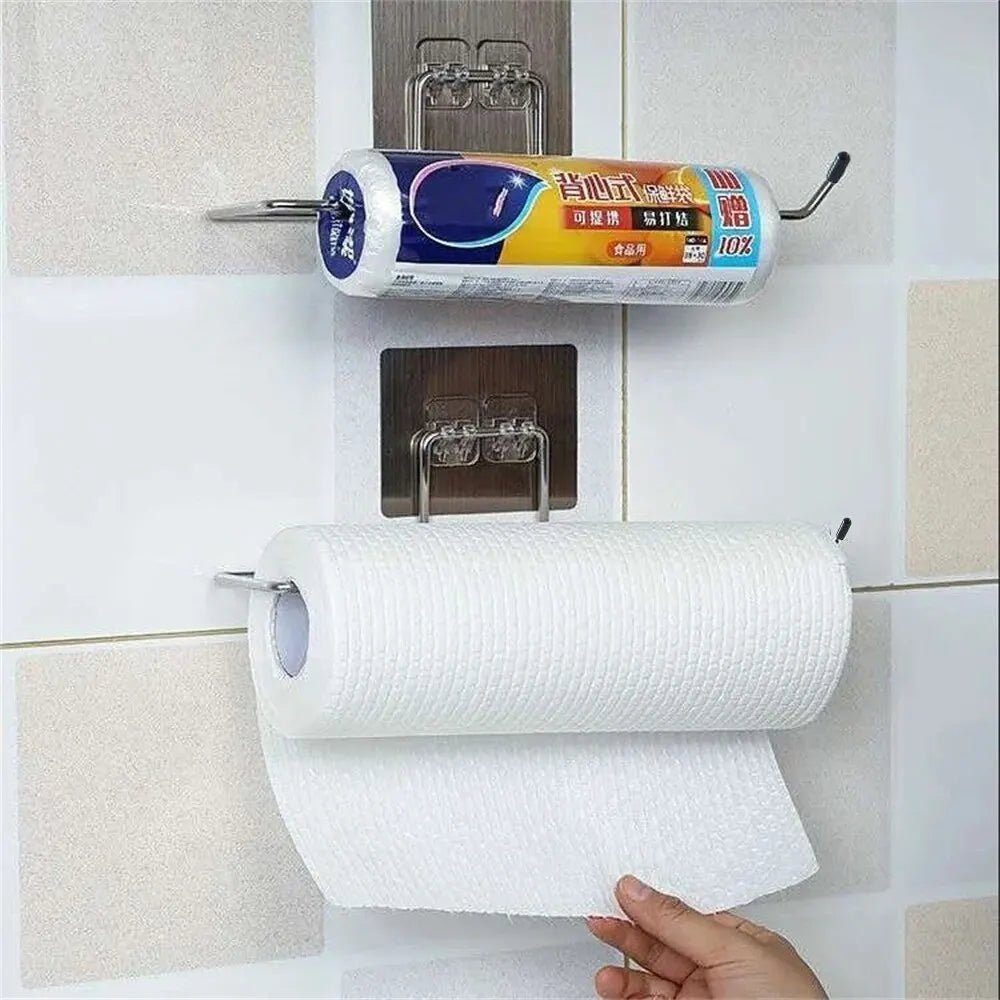 Two adhesive kitchen paper towel holders and toilet paper racks with towel hangers and tissue dispensers for cabinet storage.