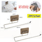Set of 2 adhesive kitchen paper towel and toilet paper holders with towel hangers and tissue dispensers, mounted on a cabinet.