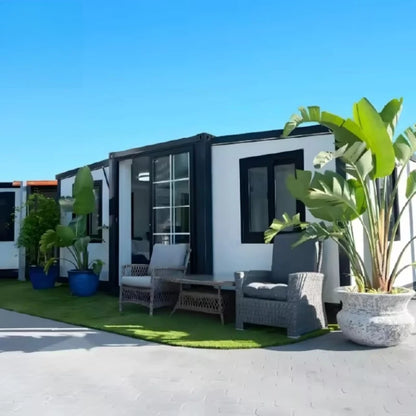 Modular container house by BACKUPMYFILESNOW.COM, showing a foldable 20ft prefab tiny home with resort camping features.