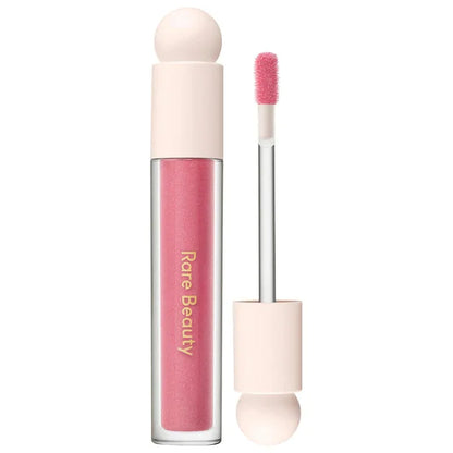 Rare Beauty 3D Face Contour Bronze Stick with natural finish, concealer, moisturizer, and glossy lipstick for makeup.