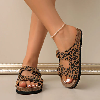Suede Birken-style women's sandals with soft footbed, cork accents, and retro clogs design, perfect for spring and summer wear.