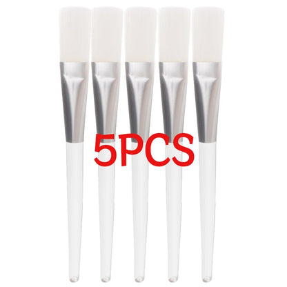 Pink beauty facial masks brushes set with soft hair applicators for DIY face masks, makeup, and spa facial care tools.