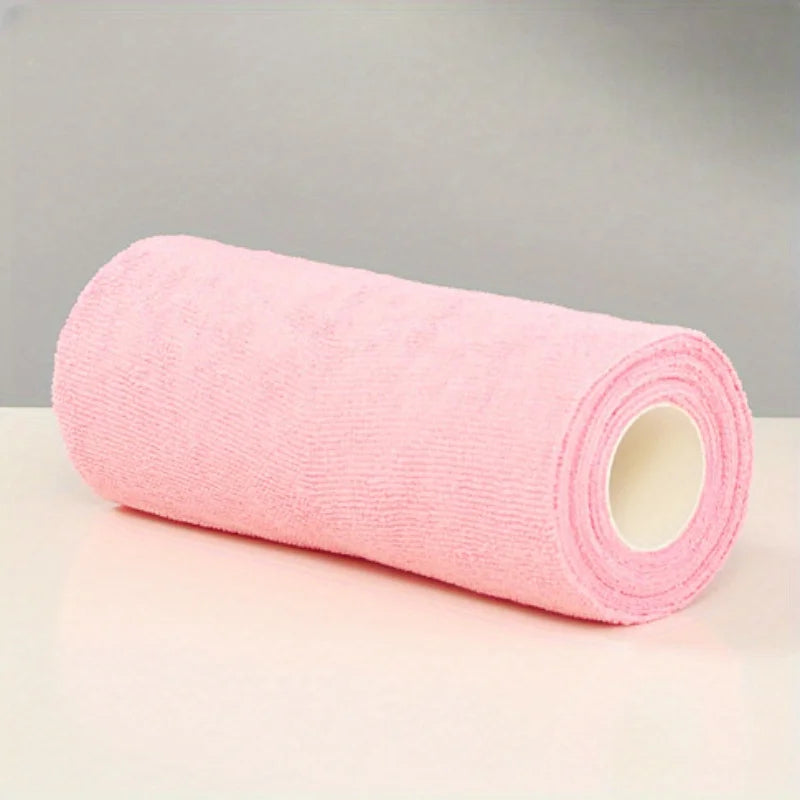 Pink microfiber cleaning cloths on a roll, 20 reusable kitchen towels with multi-sided design for household cleaning tasks.