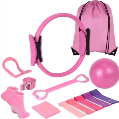 Pink 13-piece yoga and Pilates set by BackupMyFilesNow.com includes mats, blocks, straps, and accessories for exercise.