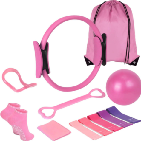 Pink 13-piece yoga and Pilates set from BackupMyFilesNow.com including mats, blocks, and straps for exercise and flexibility.