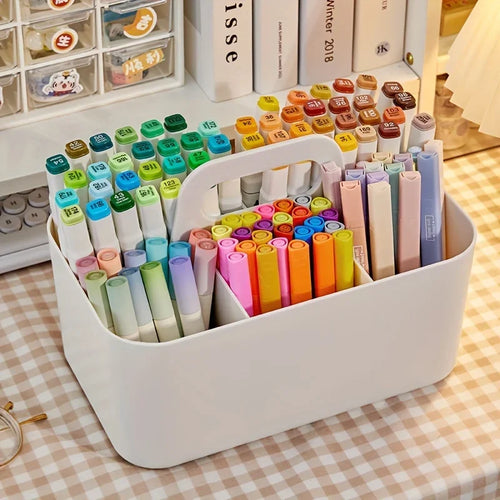 Pink plastic storage basket with five compartments and handle, ideal for organizing pens, pencils, and stationery on office desks.