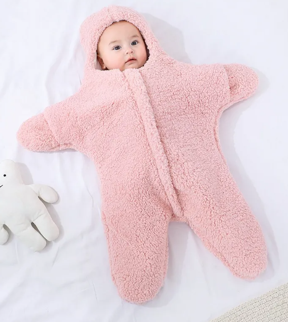 Pink baby quilt by BackupMyFilesNow.com featuring soft fabric and cozy design for infants and young children.