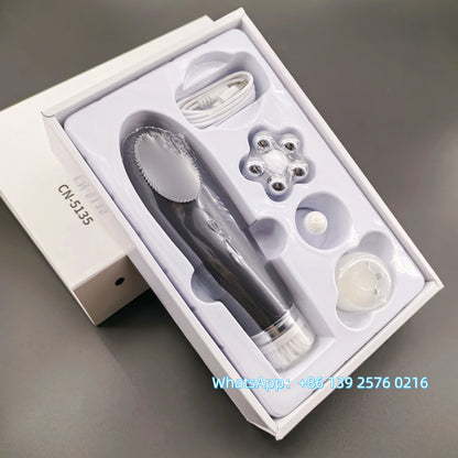 Pink BackupMyFilesNow.com 4-in-1 facial skin lifting device with electric silicone brush for deep cleansing and skin rejuvenation.