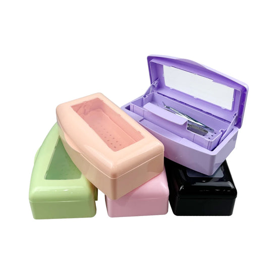 Pink dental instrument sterilizer disinfection box with manicure nail tools, tweezers, surgical pliers, and sterilizing tray.