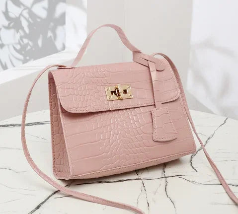 Pink women's messenger handbags set, stylish and functional, perfect for 2024, featuring large capacity and versatile design.