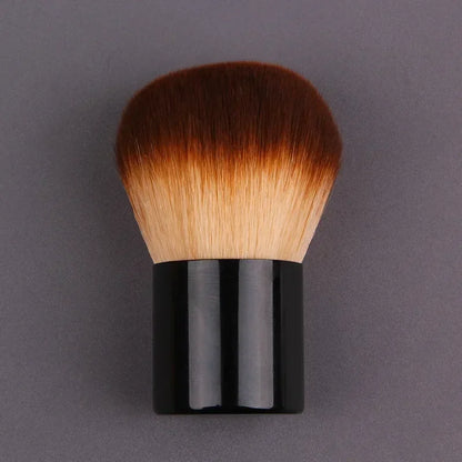 Pink and gold makeup brush with round angled top for foundation, blush, concealer, contour, and highlighting blending.