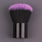 Pink gold makeup brush with round angled top for foundation, blush, concealer, contour, and highlighter blending.
