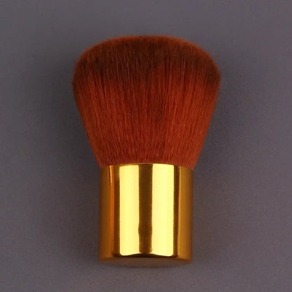 Pink gold makeup brush for foundation, blush, concealer, contour, and highlight with round angled top for blending and precise application.